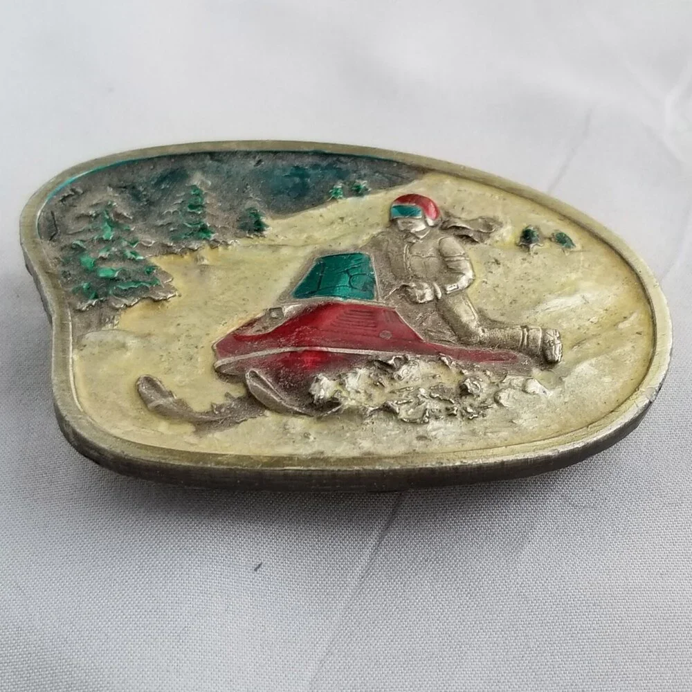 Vintage Belt Buckle 1977 Snowmobile Riding On Snow‎ Colorized USA By Bergamot